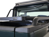 Ineos Grenadier Quartermaster (2023-Current) Roller Tonneau Cover Slimline II Load Bed Rack Kit - Brixton 4x4 - Buy Online Now!