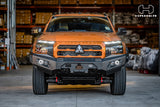 Hamer 4x4 King Series bull bar on Mitsubishi Triton MV, front-on view showing LED lighting