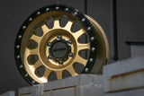 Method 315 Gold wheel with black beadlock style lip detail