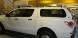 Close-up of EGR Premium Canopy's lock and tinted glass on Mazda BT-50