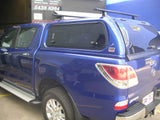 Close-up of EGR Premium Canopy's lock and tinted glass on Mazda BT-50