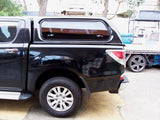 Close-up of EGR Premium Canopy's lock and tinted glass on Mazda BT-50