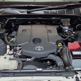 Pre-filter mounting location in Toyota Hilux N90 engine bay