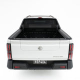 Rear view of HSP Roll Mate tonneau cover rolled open on an MG U9